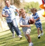 father-sons-playing-in-the-park-1